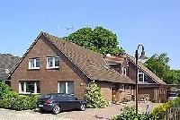 Ferienwohnung in Dunum ruhige l�ndliche Lage, eigener Gartenbereich zum grillen und relaxen.