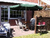Ostfriesisches Ferienhaus mit Gartenterrasse in Norddeich vor der Insel Norderney zu vermieten
