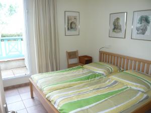 Schlafzimmer mit Balkonzugang