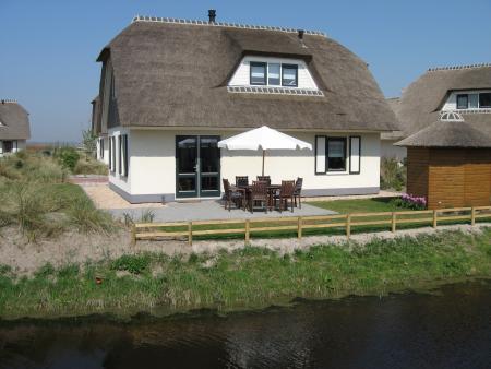 Ferienhaus in Julianadorp aan Zee, Nord-Holland direkt hinter den Dünen, ausgezeichnet mit 5 Sternen