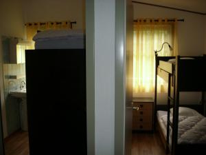 Blick vom Flur in die beiden kleineren Schlafzimme