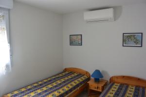 Schlafzimmer 2 mit 2 Einzelbetten im OG