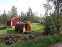 Das Tiny House 'Camping Pod' bietet ein separates Duschbad und eine Westterrasse für 2 Personen